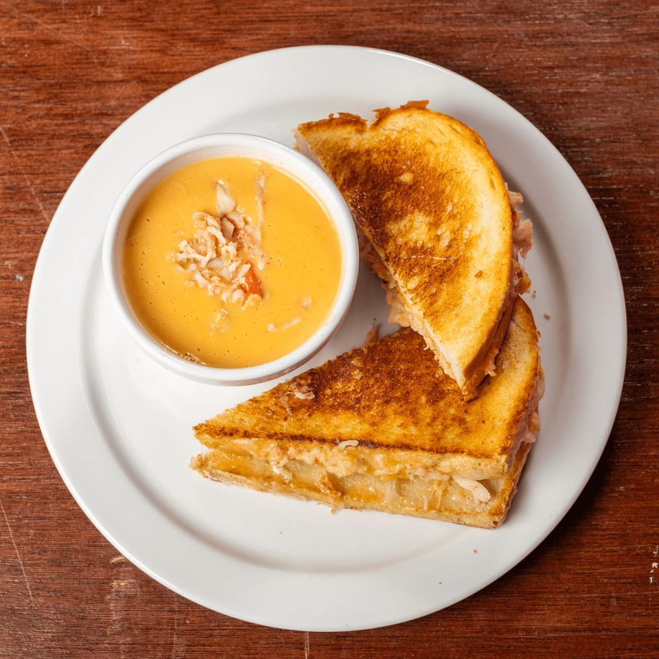 Lobster & Beer NASA's lobster grilled cheese sandwich and a bowl of creamy lobster bisque.